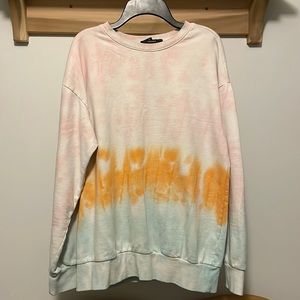 a tie dye crewneck